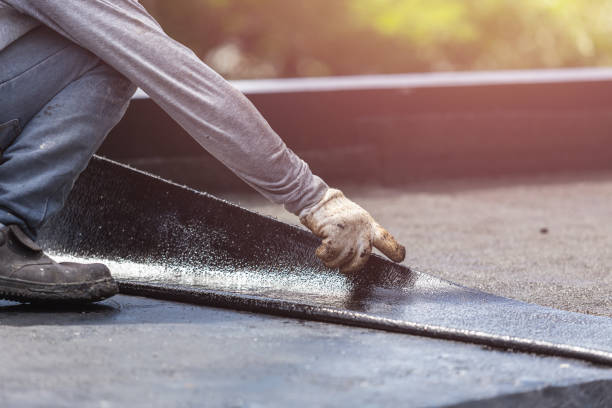 Professional Basement Waterproofing technician working in Bedford, IN